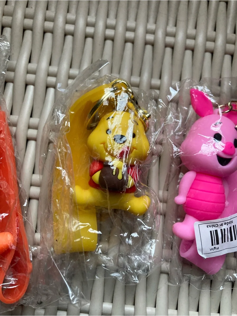 Whinny the Pooh, pink piglet, and tigger key chains . And Eeyore too